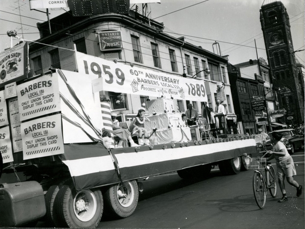 Here is a float celebrating the 60th anniversary of Barbers Local 131 moving up James Street North on September 8, 1959. They have just reached the corner of King and James and you can see the old City Hall in the background. Here is a float celebrating the 60th anniversary of Barbers Local 131 moving up James Street North on September 8, 1959. They have just reached the corner of King and James and you can see the old City Hall in the background.